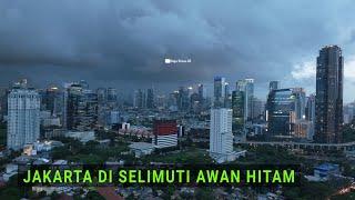 Drone Jakarta Sore Hari Dengan View Awan Hitam diantara Gedung - Gedung Pencakar Langit Indonesia