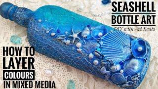 Bottle decoration with seashells / Coastal Decor / Mixed Media Bottle Art