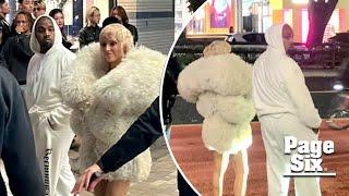 Bianca Censori wears just a fur coat and debuts drastic hair transformation in Tokyo with Kanye West