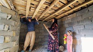 Wood, planks and tradition: a single mother's tools to cover the roof of a magical cave