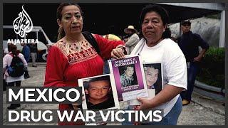 Mexico drug war:  Victims' families look for relatives' bodies