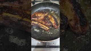 Rib steak in the pan fried until golden brown