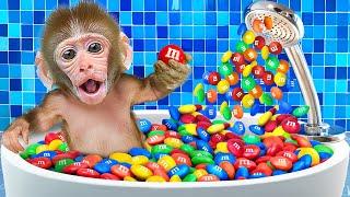 KiKi Monkey bathing in Bathroom with Magic M&M Candy Shower in Rainbow Bathtub | KUDO ANIMAL KIKI