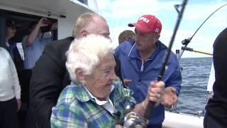 Hazel McCallion lands the big one as Rob Ford and Italo Labignan cheer her on.