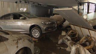 Storeowners assess damage a day after severe rainstorms and flooding in Turkey