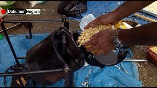 Cara membuat popcorn dengan alat meriam tradisional