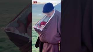 Tibetan father carrying a baby in kangaroo style. #tibetan #daddystyle #cutebabyshorts #babyreels