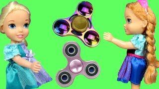 Fidget Spinners !  Elsa & Anna Toddlers in Spinner Land - Toy Dinosaur