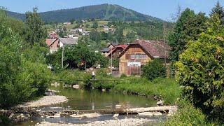 Славське 2022: центр, річка Опір, місточок, вид на Тростян, гори вражень 25 червня 2022 р.