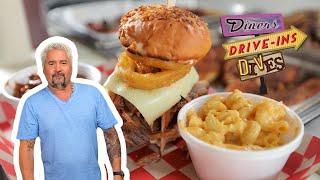 Guy Fieri Eats a Massive Sausage Sandwich | Diners, Drive-Ins and Dives | Food Network