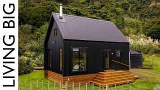 Stunning Black Off-Grid Cabin By The River