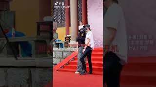 Liu YuNing and Liu ShiShi taking photos together at booting ceremony of A Journey To Love