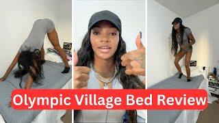 Rachel Glenn testing the Olympic Village cardboard beds