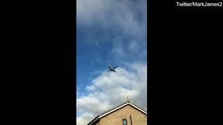 World's biggest propeller plane Antonov AN-22 flies over Manchester