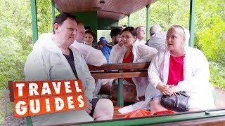 The Guides all visit a waterfall dressed 'like giant condoms' | Travel Guides 2019