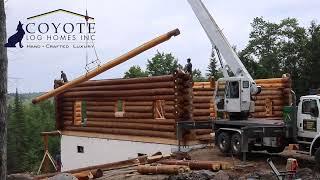 time lapse of installation of a handcrafted log home.