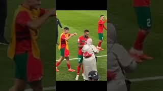 Morocco player celebrating victory with his mother.