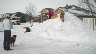 Eddie Adkins, local builder in Clovis NM, builds snow mountain for neighborhood kids of all ages!