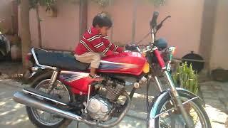 Monibe on 125 bike