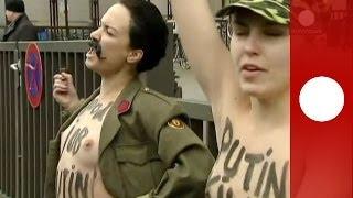 Topless against Putin: Femen activists protest in Brussels
