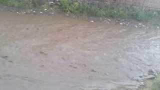 flooded street kosovo past the rain