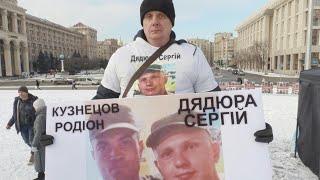 Families of Ukrainian prisoners of war raise awareness in Kyiv | AFP