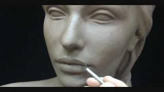Sculpting a female head in clay. Sculpting tutorial and demo.