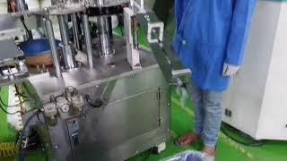 Barrel printing and syringe assembly machine