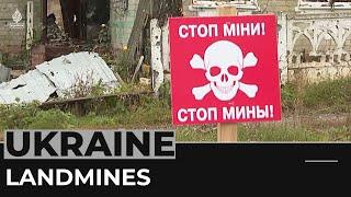 Russians accused of planting mines in Ukraine's Donetsk