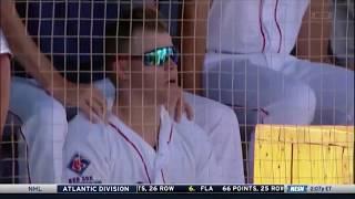 Chris Sale gives Brock Holt a neck massage in the dugout