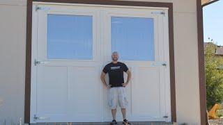 Mammoth sized carriage doors with shop made windows.