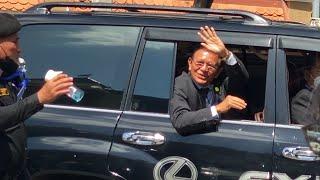 Cambodian opposition leader Kem Sokha leaves a Phnom Penh court