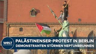PROTESTE GEGEN ISRAEL: Chaotische Szenen! Anhänger der Palästinenser stürmen Neptunbrunnen in Berlin