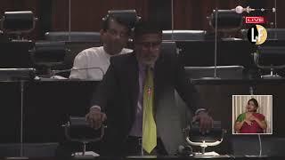 Opposition MP Mujibur Rahuman warns the Parliament of alleged plot to implicate him in a crime