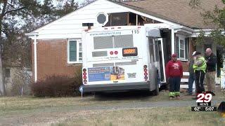 Two injured when CAT bus crashes into Albemarle home