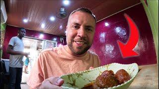 Trying Nigeria's famous Amala Abula at a well-known local restaurant in Lagos