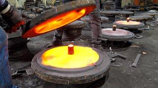 Cast iron pan manufacturing process. Metal foundry in South Korea.