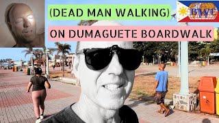 Foreigner walking the Dumaguete Boardwalk. Why do so many expats/foreigners retire here? Philippines