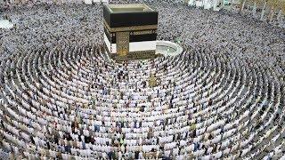 Thousands of Muslim worshippers perform prayers around the Kaaba