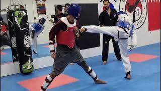 fighting moment for champions taekwondo academy team 