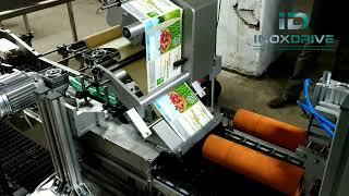 Автоматическая система для нанесения этикеток на яичные лотки