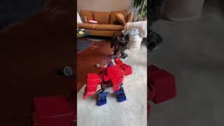 Robosen Optimus Prime VS. Megatron: The Final Battle!