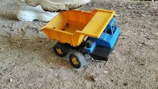 Buffalo sneakers crush old toy car