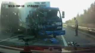 Dash cam captures Russian truck driver's lucky escape from crash