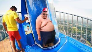 HE IS STUCK INSIDE WATERSLIDE