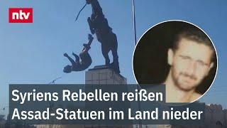 Bilder von Diktator in Badehose: Syriens Rebellen reißen Assad-Statuen im Land nieder | ntv