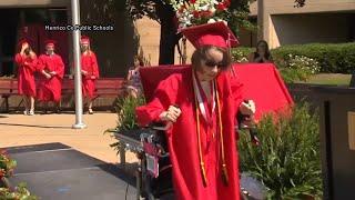 Virginia teen with cerebral palsy walks across stage at graduation