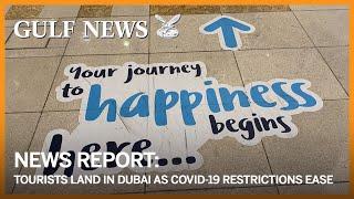 Tourists land in Dubai as COVID-19 restrictions ease