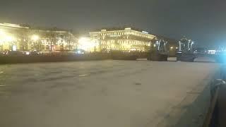 St. Petersburg on a winter night 2023. Fontanka River, Lomonosov bridge.