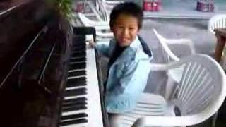 Harvey Li playing Piano at Peng Chau